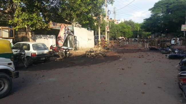 Police Force and some of the damage at Tilak Vihar