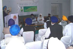L to R: Kirpal Singh Chauhan addressing, S. Masana, Baba Sewa Singh, Sukhdev Singh