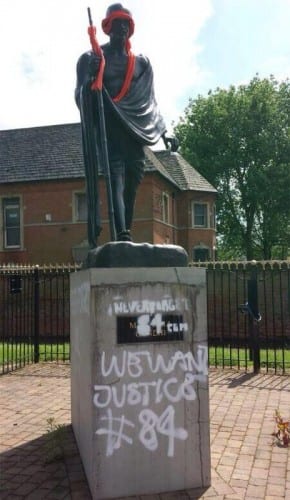 Vandalised statue of Gandhi in Leicester.