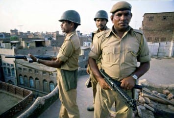 Indian troops take up position on rooftops around the Golden Temple, in Amritsar Sahib, India, in June 1984, after soldiers started to move into the complex in an attack that left thousands dead. New documents indicate that British officials were involved in the assault's planning – an incendiary revelation for Britain's Sikh community, for whom the Amritsar Genocide is still controversial, even 30 years later.