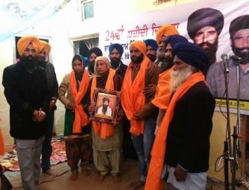 Activists of Sikh Youth Front honoring Families of Martyred Singhs