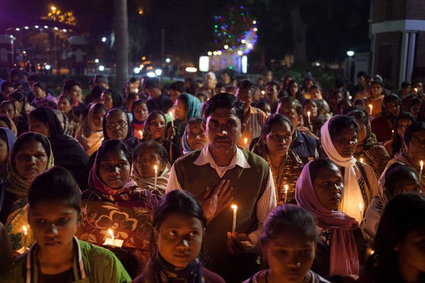 Indian Christians, suspecting arson, held a candlelight vigil in New Delhi this month after a fire destroyed St. Sebastian’s, a Catholic church there.