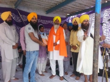 Activists of Sikh Youth Front honoring family of Shaheed Bhai Sukhdev Singh Sakhira 