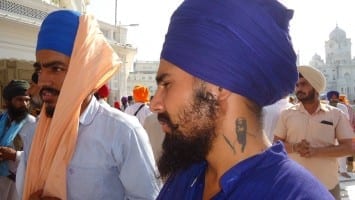 A Sikh youth showing affection with Shaheed Sant Jarnail Singh BHindranwale by having his tattoo on his neck.