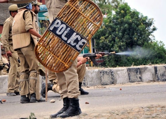 FOR MAIN TRIBUNE: Report-Amir Tantray: Police fire on sikh protesters during they protest after removed a poster of Jarnail Singh Bhindranwale by police at Rani Ragh near the airport in Jammu on Thursday. Tribune Photo: Inderjeet Singh