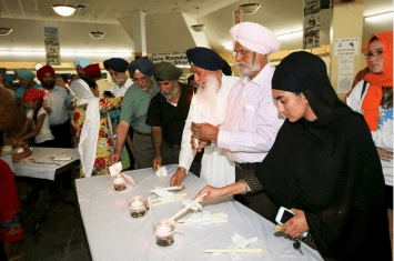 During a prayer service at the Palatine Gurdwara, members of the Sikh Religious Society remember the victims of the Emanuel Methodist Episcopal Church shooting in Charleston, South Carolina.