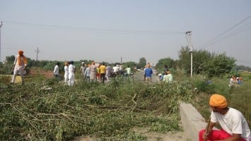 National highway blocked with Branches of trees