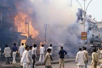 File Photo: Mobs burn down Sikh businesses and residences in 1984