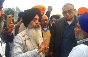 Along with Sikh leaders, justice Markandey Katju talking to people in Behbal Kalan