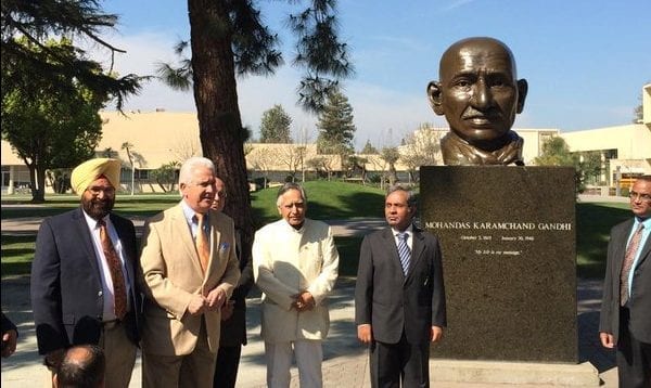 (From left to right) Sikh Council of Central California leader Charanjit Bath, Congressman Jim Costa, Dr. Sudarshan Kapoor and Ambassador Venkatesan Ashok, Consul General of India at CSU Fresno at the launch of Mohandas Gandhi statue in 2015