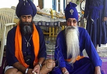 UK RSS activist Niddar ‘Singh’ with Baba Prem Singh - Source: Shastarvidiya.org
