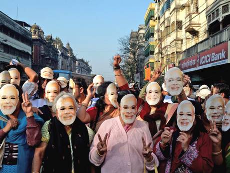 Narendra Modi's supporters participate in a rally in Kolkata (Getty Images)