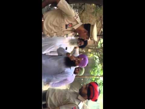 Police thrashes cameraman and Ravinder Jeet Singh Gogi (Bapu Surat Singh Khalsa&#039;s son)
