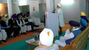 Baba Sewa Singh guiding the gathering about Environment care